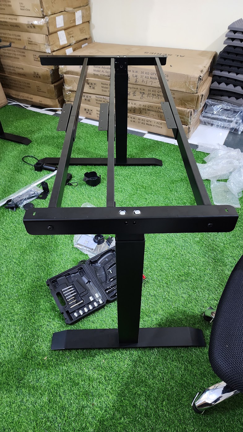 L-shaped height adjustable desk